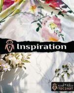 Floral print white cotton scarf fabric closeup