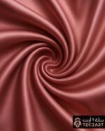 Pink satin scarf fabric closeup